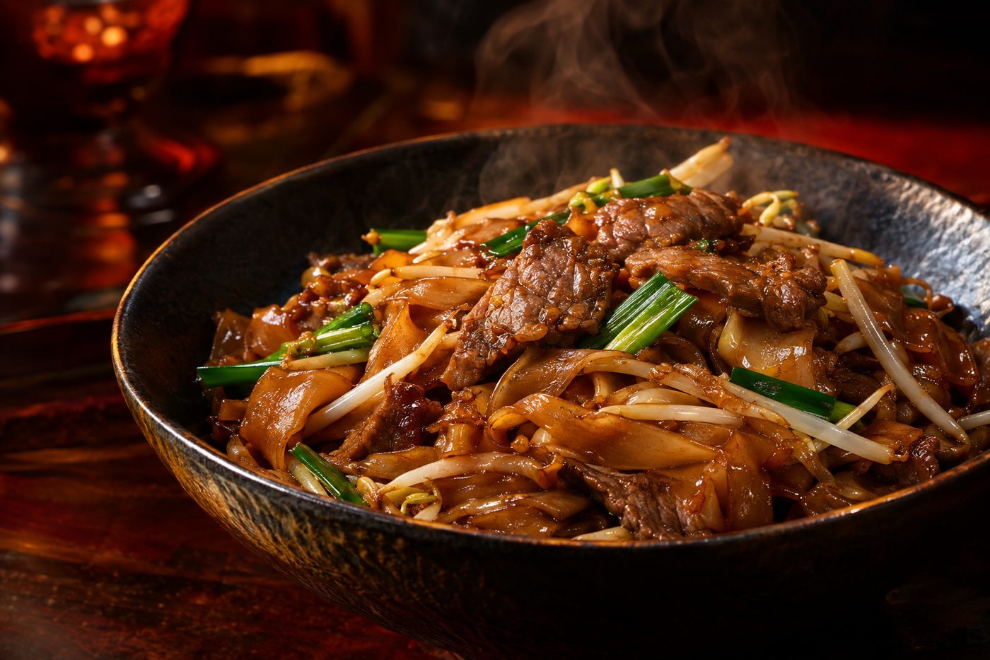 Wok-fired beef ho fun flat rice noodles